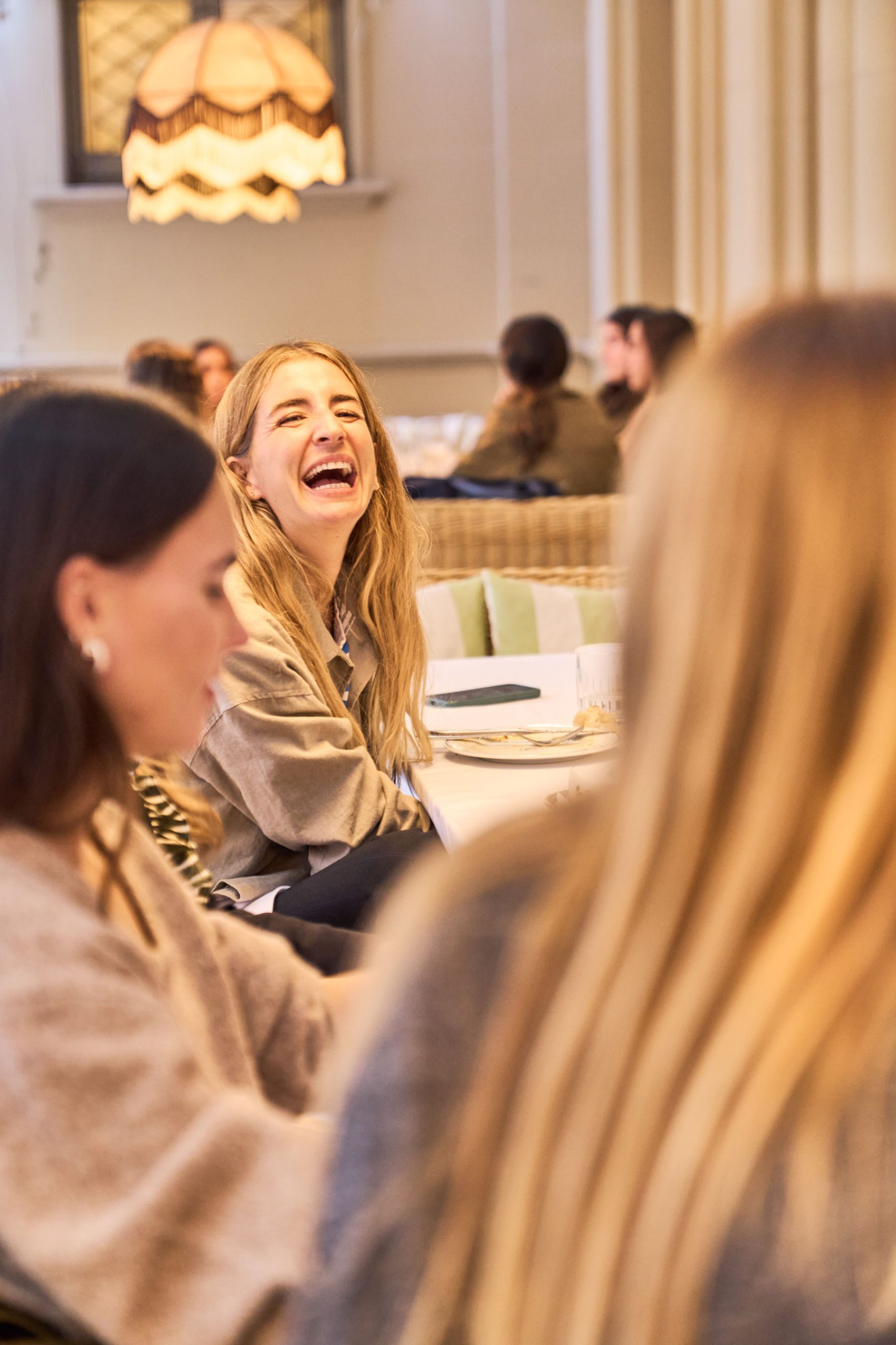 Fashion editors and influencers at MICUIR Wild Rouge Autumn-Winter 2025 collection launch lunch in Barcelona.